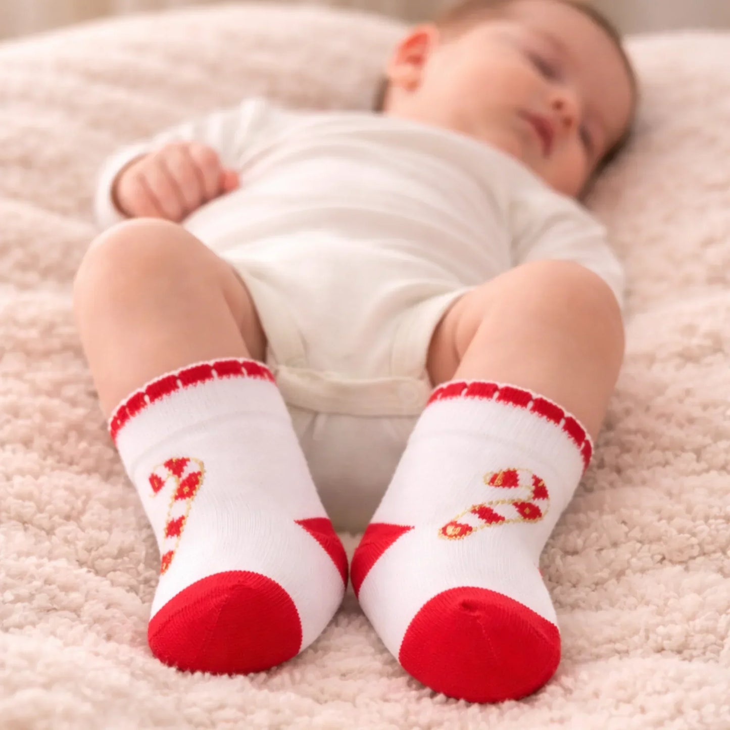 Festive Candy Cane Baby Socks – White & Red